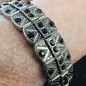 Sterling-Style Silver Bracelet with Deep Red Garnet stretch. 8 inch.